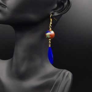 Boucles d’oreilles rouges plumes bleues